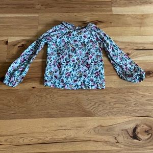 A beautiful floral shirt with green, pink, yellow